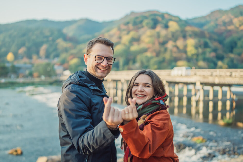 Engaged couple enjoying a romantic moment in beautiful soft natural light during a Kyoto engagement photoshoot