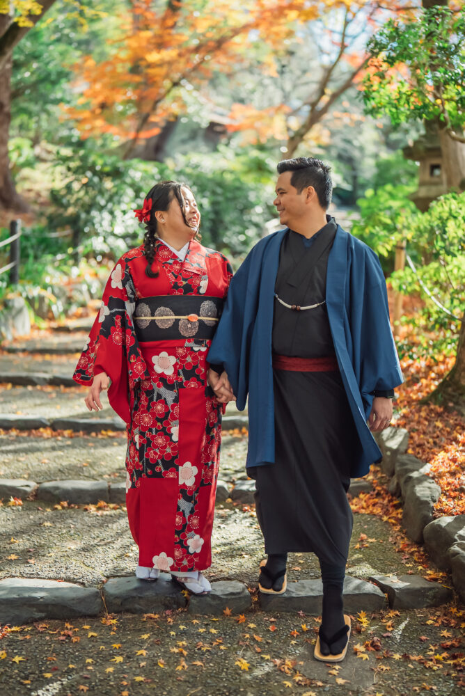 Kimono Couple Walking Through Autumn Foliage at Maruyama Park Kyoto