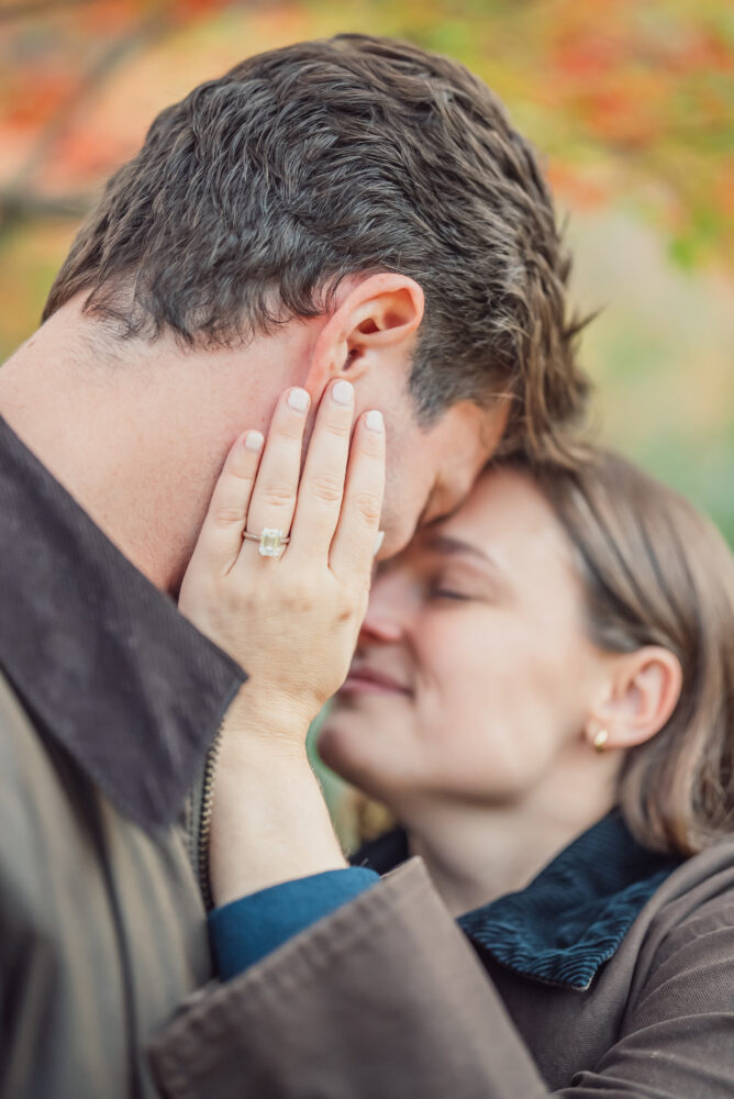 Cinematic photo of a romantic proposal surrounded by autumn colors in Arashiyama Kyoto